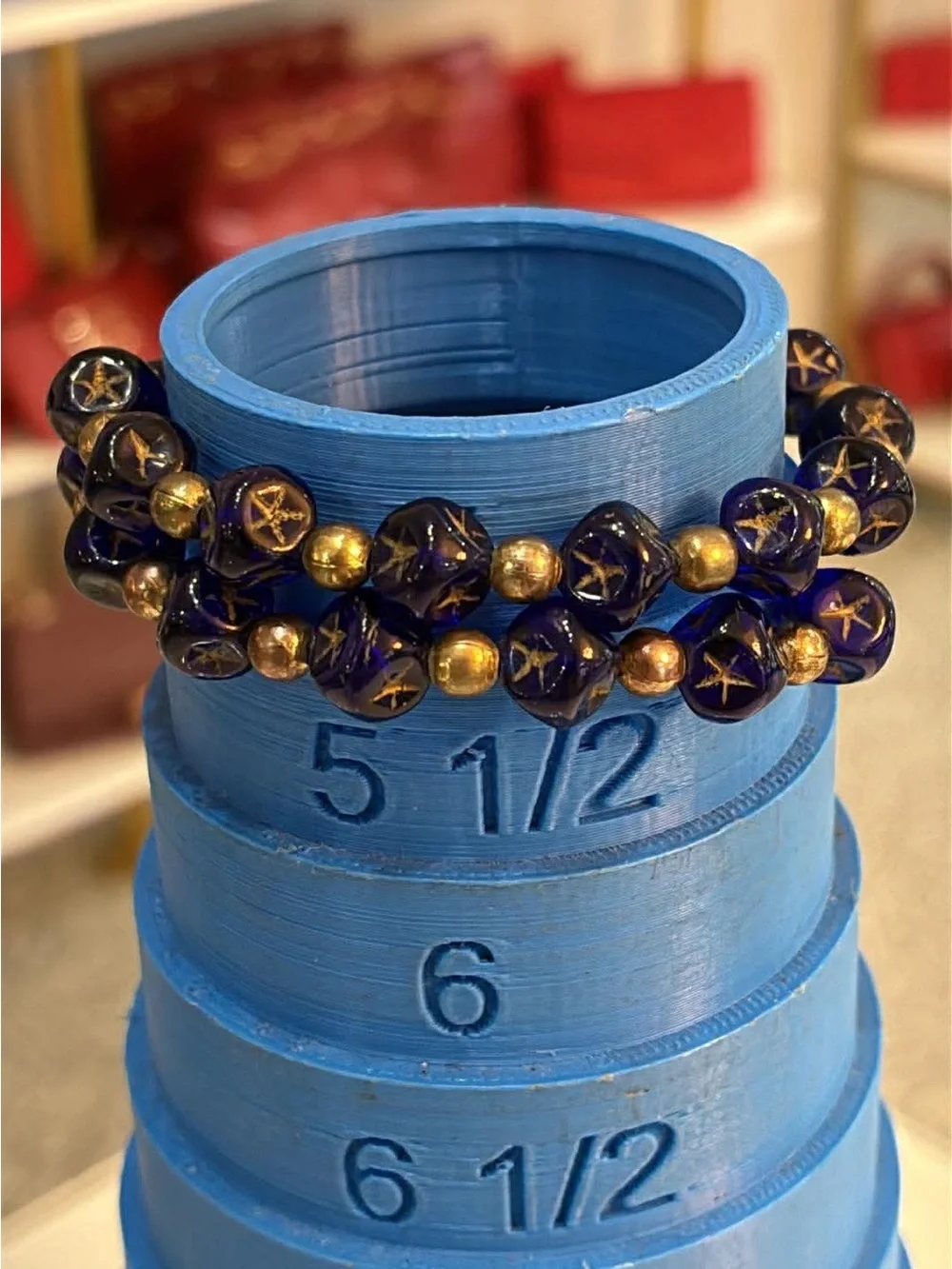 Handcrafted Blue Glass Bead Bracelet with Gold Accents